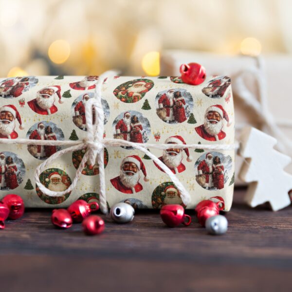 Santa & Mrs. Claus Christmas Ornaments Wrapping Paper! Featuring a heartwarming design of Black Santa and Mrs. Claus surrounded by festive holiday balls, this wrapping paper celebrates diversity while adding a sophisticated touch to your gifts. Ideal for creating meaningful and memorable holiday moments.